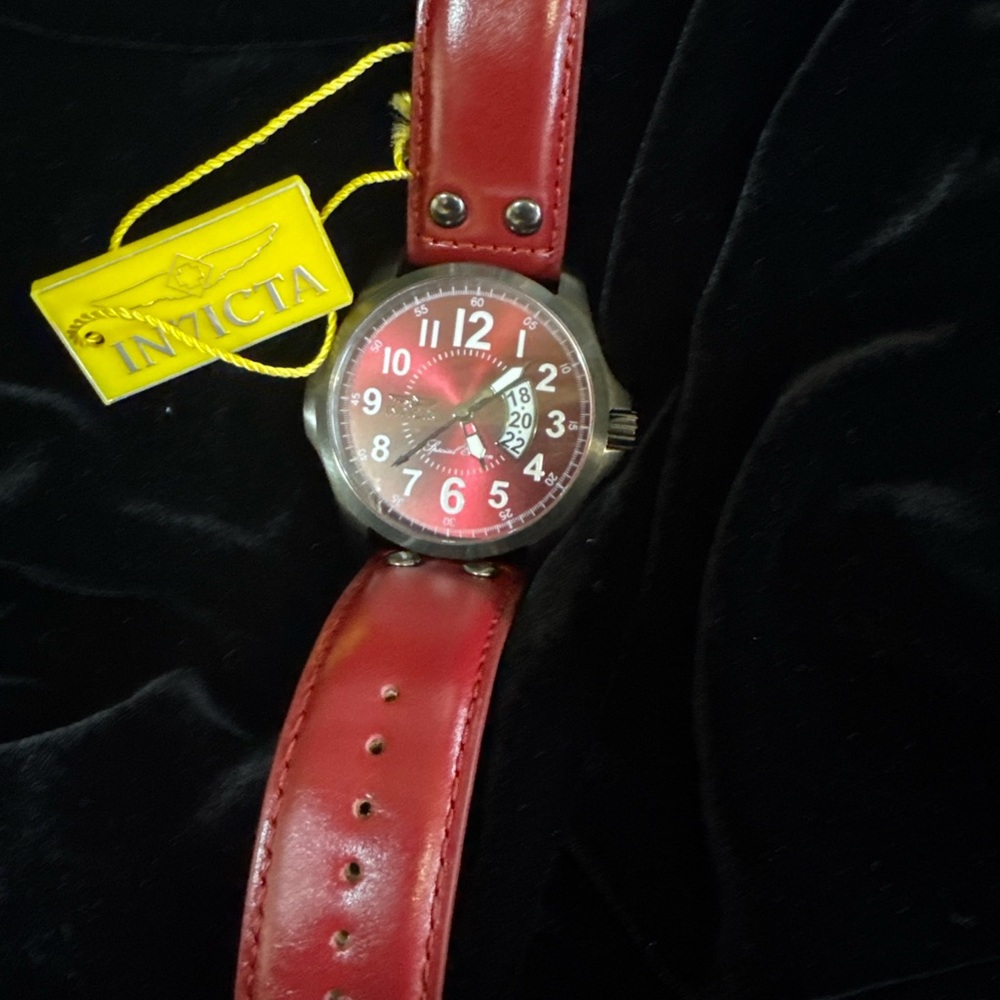 Invicta Watch with Red Strap and Silver Case